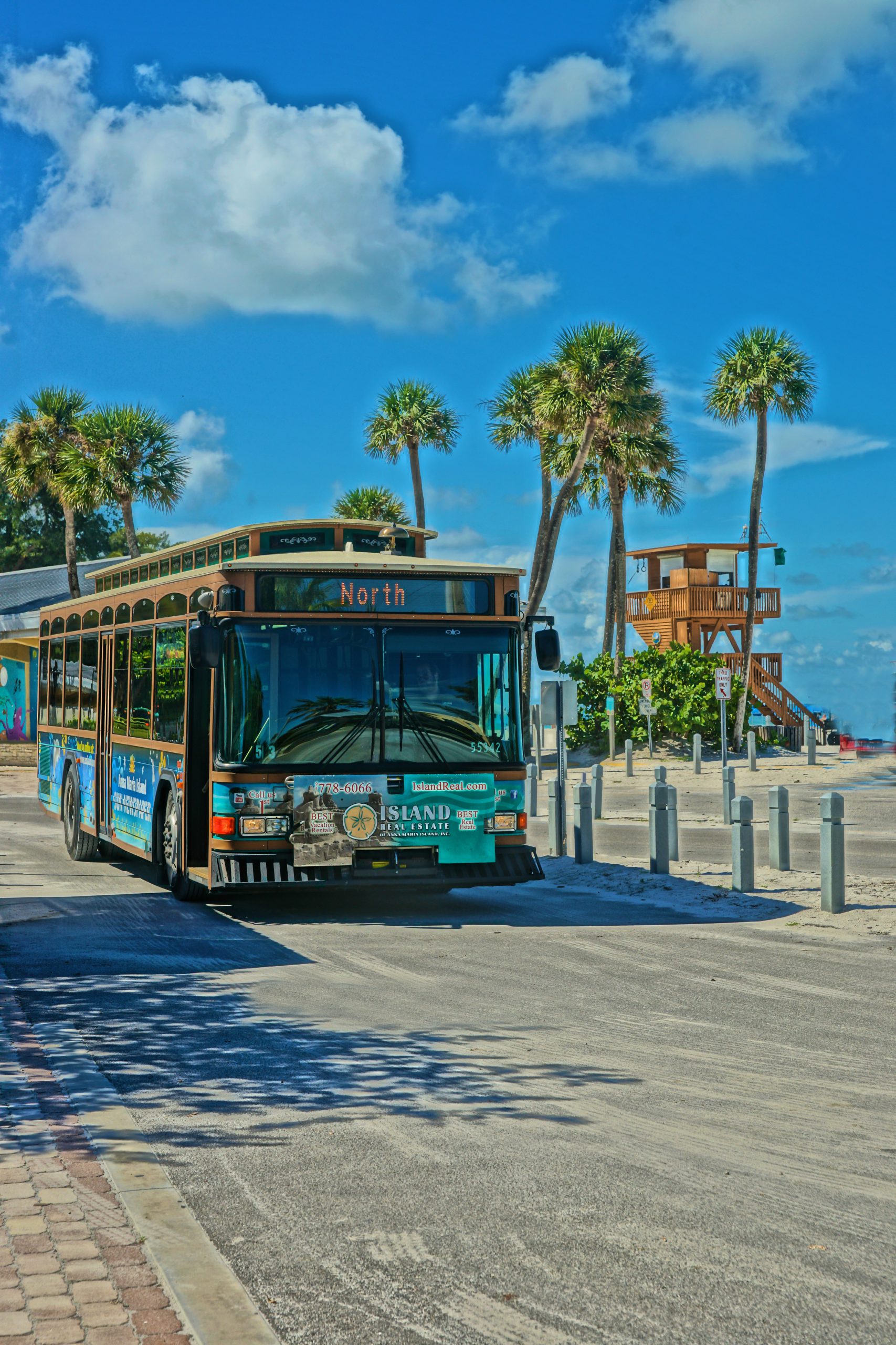 Trolley with Island Real Estate advertising